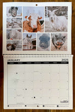 Load image into Gallery viewer, Calendar open to January with a collage of photographs of farm animals.
