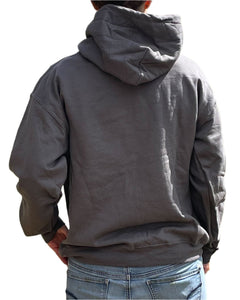 Back view of a woman wearing a dark grey hoodie